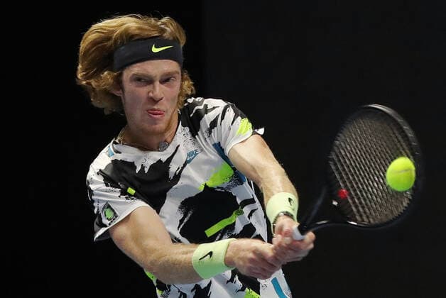 ST PETERSBURG, RUSSIA - OCTOBER 13, 2020: Russian tennis player Andrei Rublev struggles in a Round of 32 match against his Canadian rival Vasek Pospisil during the St Petersburg Open 2020 international tournament held at Sibur Arena. Alexander Demianchuk TASS  TS0EAB6E
