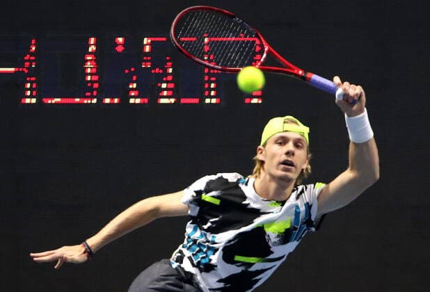 ST PETERSBURG, RUSSIA - OCTOBER 14, 2020: Canadian tennis player Denis Shapovalov struggles in a Round of 32 match against his Serbian rival Viktor Troicki during the St Petersburg Open 2020 international tournament held at Sibur Arena. Alexander Demianchuk TASS  TS0EAC55