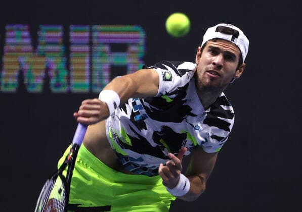 ST PETERSBURG, RUSSIA - OCTOBER 14, 2020: Russian tennis playes Karen Khachanov struggles in a men s doubles quarter-final match against his rivals Alexander Bublik of Kazakhstan and Reilly Opelka of the US during the St Petersburg Open 2020 international tournament held at Sibur Arena. Alexander Demianchuk TASS  TS0EAD2E