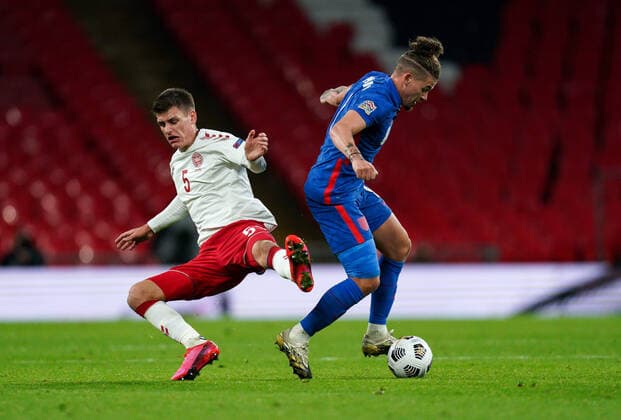 Kalvin Phillips (Leeds United) of England evades the challenge of Joakim Maehle (Genk) of Denmark during the UEFA Nations League match played behind closed doors due to the current government Covid-19 rules within sports venues between England and Denmark at Wembley Stadium, London, England on 14 October 2020. Copyright: xAndyxRowlandx PMI-3658-0120