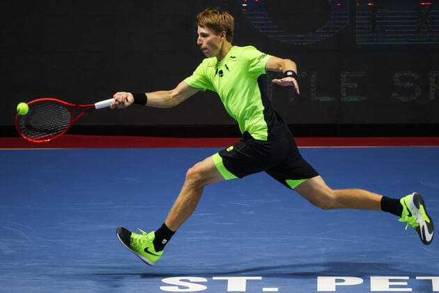 ST PETERSBURG, RUSSIA - OCTOBER 15, 2020: Belarusian tennis player Ilya Ivashka struggles in a Round of 16 match against his Canadian rival Denis Shapovalov during the St Petersburg Open 2020 international tournament held at Sibur Arena. Alexander Demianchuk TASS  TS0EAE32