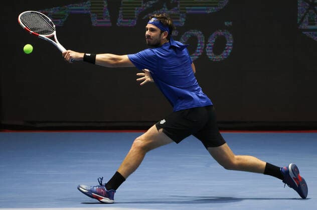 ST PETERSBURG, RUSSIA - OCTOBER 16, 2020: The UK s Cameron Norrie returns the ball in a quarterfinal match against Russia s Andrey Rublev at the St Petersburg Open 2020 international tournament held at Sibur Arena. Alexander Demianchuk TASS  TS0EB014