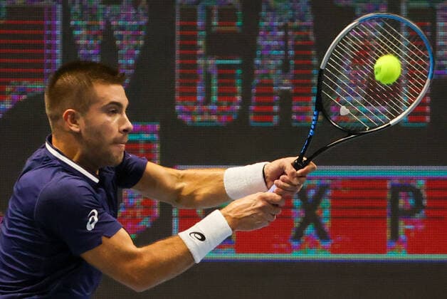 ST PETERSBURG, RUSSIA - OCTOBER 16, 2020: Croatia s Borna Coric returns the ball in a quarterfinal match against the USA s Reilly Opelka at the St Petersburg Open 2020 international tournament held at Sibur Arena. Alexander Demianchuk TASS  TS0EB0A2