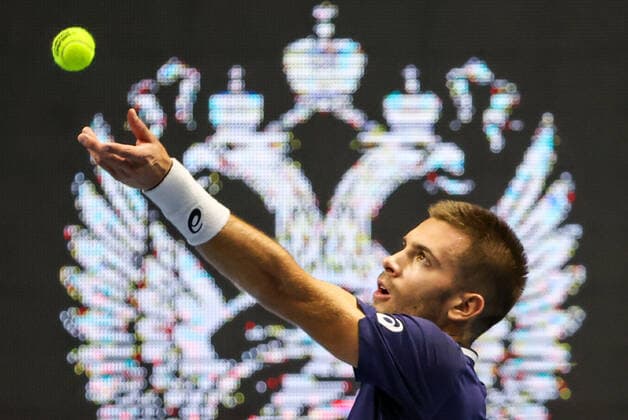 ST PETERSBURG, RUSSIA - OCTOBER 16, 2020: Croatia s Borna Coric serves the ball in a quarterfinal match against the USA s Reilly Opelka at the St Petersburg Open 2020 international tournament held at Sibur Arena. Alexander Demianchuk TASS  TS0EB0A4