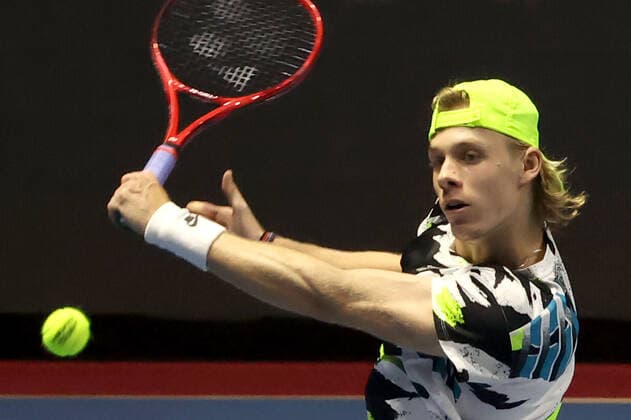 ST PETERSBURG, RUSSIA - OCTOBER 17, 2020: Canada s Denis Shapovalov returns the ball in a semifinal match against Russia s Andrey Rublev at the St Petersburg Open 2020 international tournament held at Sibur Arena. Alexander Demianchuk TASS  TS0EB29E