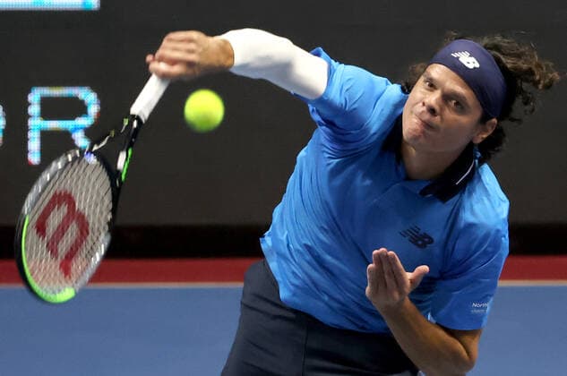 ST PETERSBURG, RUSSIA - OCTOBER 17, 2020: Canada s Milos Raonic returns the ball in a semifinal match against Croatia s Borna Coric at the St Petersburg Open 2020 international tournament held at Sibur Arena. Alexander Demianchuk TASS  TS0EB34C