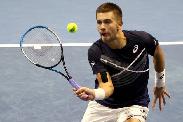 ST PETERSBURG, RUSSIA - OCTOBER 17, 2020: Croatia s Borna Coric returns the ball in a semifinal match against Canada s Milos Raonic at the St Petersburg Open 2020 international tournament held at Sibur Arena. Alexander Demianchuk TASS  TS0EB350