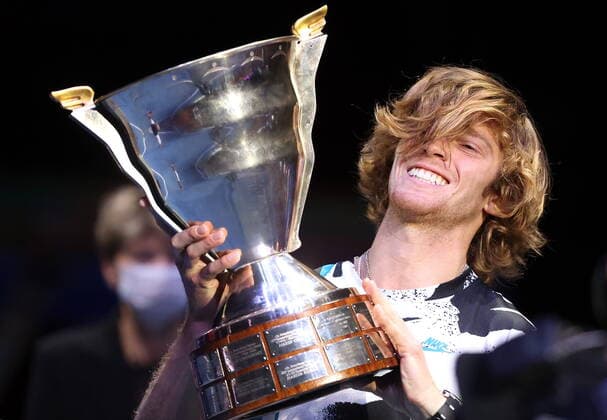 ST PETERSBURG, RUSSIA - OCTOBER 18, 2020: Russia s tennis player Andrei Rublev celebrates with the trophy after winning the final match against Croatia s Coric at the 2020 St Petersburg Open International Tournament at Sibur Arena. Andrei Rublev won the match 6-4, 7-6. Alexander Demianchuk TASS  TS0EB4AC