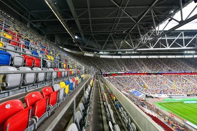 Soccer, Bundesliga, Germany, Men, Season 2020 2021, 4 Matchday, Merkur Spiel Arena Düsseldorf, Fortuna Düsseldorf, F95 red Jahn Regensburg black 2 2 The colorful seats in the empty Merkur Spiel Arena Feature, Symbol, Symbol Image, Corona, Covid 19, Ghost Game DFL REGULATIONS PROHIBIT ANY USE OF PHOTOGRAPHS AS IMAGE SEQUENCES AND OR QUASI VIDEO