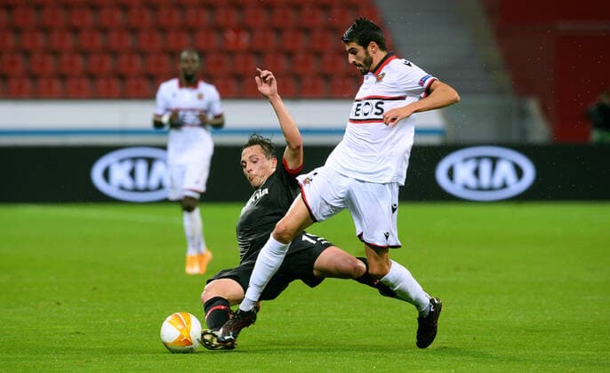 Football, UEFA Europa League, Men, Season 2020 2021, Group C, 1 Matchday, BayArena Leverkusen, Bayer Leverkusen black OGC Nice white Julian Baumgartlinger LEV , Pierre Lees Melou NIZ Aktion DFL UEFA REGULATIONS PROHIBIT ANY USE OF PHOTOGRAPHS AS IMAGE SEQUENCES AND OR QUASI VIDEO