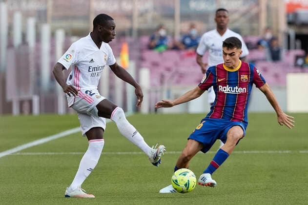 October 24, 2020, Barcelona, Spain: Ferland Mendy of Real Madrid in action with Pedri of FC Barcelona, Barca during the Liga match between FC Barcelona and Real Madrid at Camp Nou on October, 24 2020 in Barcelona, Spain. Barcelona Spain - ZUMAd159 20201024_zia_d159_022 Copyright: xDavidxRamirezx