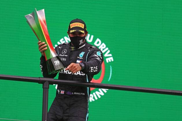 25th October 2020; Algarve International Circuit, Portimao, Portugal; Formula One, Portugal Grand Prix, Race Day; Mercedes AMG Petronas F1 W11 EQ Performance, Lewis Hamilton takes his 92nd win as he celebrates on the podium  ActionPlus12243281 Octane