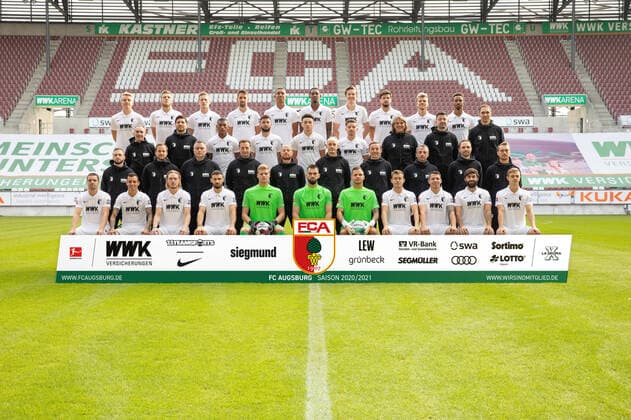 FC Augsburg 1907 1 BL, portrait date 2020 2021, team photo, hi row from left Felix Götze, Jeffrey Gouweleeuw, AndrÃ Hahn, Rani Khedira, Felix Uduokhai, Reece Oxford, Michael Gregoritsch, Tobias Strobl, Florian Niederlechner, Noah Sarenren Bazee 2 row back Salvatore Belardo Zeugwart , Benjamin Brust Videoanalyst , Carlos Gruezo, Marco Richter, Ruben Vargas, Mads Pedersen, Dr Andreas Weigel, Dr Christian Wimmer, Dr Florian Elser Team doctors 3 row back Martin Miller, Rudi Ehmann, Markus Zeyer Physiotherapists , Kristian Barbuscak Goalkeeping Coach , Jonas Scheuermann Co-Trainer , Heiko Herrlich Coach , Tobias Zellner Co-Trainer , Iraklis Metaxas Co-Trainer , Daniel Müller, Andreas Bäumler rehab and athletics coach front row from left Raphael Framberger, Amaral Borduchi, Iago, Hans Fredrik Jensen, Daniel Caligiuri, Benjamin Leneis, Tomas Koubek, Rafal Gikiewicz, Alfred Finnbogason, Marek Suchy, Jan Moravek, Robert Gumny