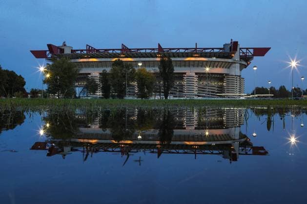 A general view of the stadium reflected in a puddle prior to the UEFA Champions League match at Giuseppe Meazza, Milan. Picture date: 29th October 2020. Picture credit should read: Jonathan Moscrop Sportimage EDITORIAL USE ONLY. No use with unauthorised audio, video, data, fixture lists, club league logos or live services. Online in-match use limited to 120 images, no video emulation. No use in betting, games or single club league player publications. SPI-0712-0001