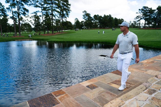 Bryson DeChambeau walks on a bridge on the 15th fairway during a practice round before the 2020 Masters golf tournament at the Augusta National Golf Club in Augusta, Georgia on Monday, November 9, 2020.  AUG20201109342 KEVINxDIETSCH