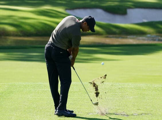 Tiger Woods hits his tee shot on the 12th hole in the first round of the 2020 Masters golf tournament at Augusta National Golf Club in Augusta, Georgia on Thursday, November 12, 2020.  AUG20201112819 KevinxDietsch