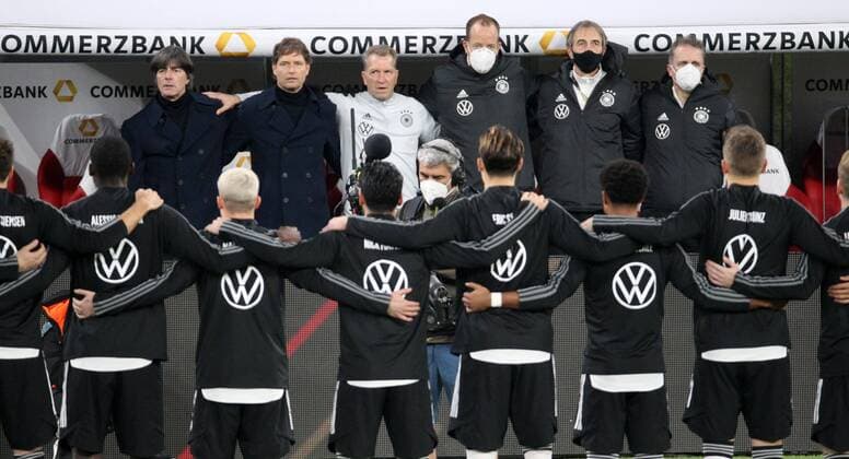 GER, UEFA Nations League A, Germany vs. Ukraine 14 11 2020, Leipzig, Red Bull Arena, UEFA Nations League A Group 4 , 5 Matchday, Germany vs. Ukraine the match takes place without spectators due to the Corona Pandemic in the picture Coach Joachim Löw Germany and his team during the national anthem According to the guidelines of the DFB Deutscher Fussballbund it is prohibited, to use or have used photographs taken in the stadium and or of the match in the form of sequence images and or video-like photo sequences DFL regulations prohibit any use of photographs as image sequences and or quasi video