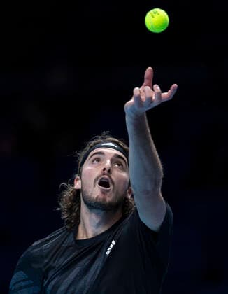 (201116) -- LONDON, Nov. 16, 2020 -- Stefanos Tsitsipas of Greece serves during the singles group match against Dominic Thiem of Austria at the ATP, Tennis Herren World Tour Finals 2020 in London, Britain, on Nov. 15, 2020. ) (SP) BRITAIN-LONDON-TENNIS-ATP FINAL-DAY 1 HanxYan 