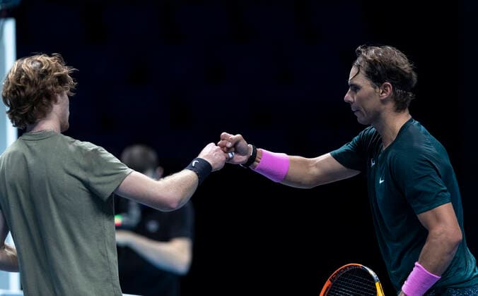 (201116) -- LONDON, Nov. 16, 2020 -- Rafael Nadal of Spain greets with Andrey Rublev of Russia after their singles group match at the ATP, Tennis Herren World Tour Finals 2020 in London, Britain, on Nov. 15, 2020. ) (SP) BRITAIN-LONDON-TENNIS-ATP FINAL-DAY 1 HanxYan 