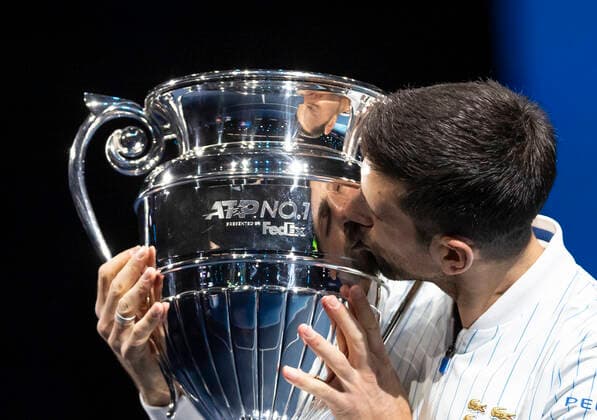 (201116) -- LONDON, Nov. 16, 2020 -- Novak Djokovic of Serbia kisses his ATP, Tennis Herren World No. 1 trophy at the ATP World Tour Finals 2020 in London, Britain, on Nov. 15, 2020. ) (SP) BRITAIN-LONDON-TENNIS-ATP FINAL-WORLD NUMBER 1 HanxYan 