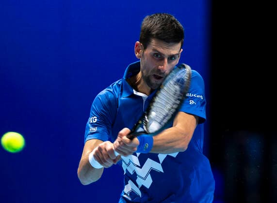 (201117) -- LONDON, Nov. 17, 2020 -- Novak Djokovic of Serbia hits a return during the singles group match against Diego Schwartzman of Argentina at the ATP, Tennis Herren World Tour Finals 2020 in London, Britain, on Nov. 16, 2020. ) (SP)BRITAIN-LONDON-TENNIS-ATP FINALS-DAY 2 HanxYan 