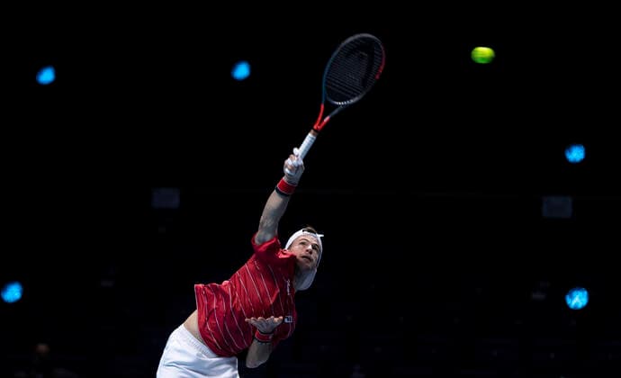(201117) -- LONDON, Nov. 17, 2020 -- Diego Schwartzman of Argentina serves during the singles group match against Novak Djokovic of Serbia at the ATP, Tennis Herren World Tour Finals 2020 in London, Britain, on Nov. 16, 2020. ) (SP)BRITAIN-LONDON-TENNIS-ATP FINALS-DAY 2 HanxYan 