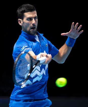(201117) -- LONDON, Nov. 17, 2020 -- Novak Djokovic of Serbia hits a return during the singles group match against Diego Schwartzman of Argentina at the ATP, Tennis Herren World Tour Finals 2020 in London, Britain, on Nov. 16, 2020. ) (SP)BRITAIN-LONDON-TENNIS-ATP FINALS-DAY 2 HanxYan 