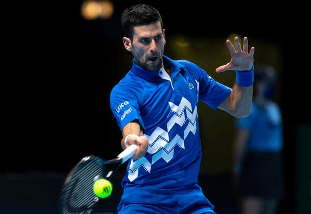 (201117) -- LONDON, Nov. 17, 2020 -- Novak Djokovic of Serbia hits a return during the singles group match against Diego Schwartzman of Argentina at the ATP, Tennis Herren World Tour Finals 2020 in London, Britain, on Nov. 16, 2020. ) (SP)BRITAIN-LONDON-TENNIS-ATP FINALS-DAY 2 HanxYan 