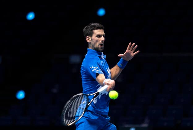 (201117) -- LONDON, Nov. 17, 2020 -- Novak Djokovic of Serbia hits a return during the singles group match against Diego Schwartzman of Argentina at the ATP, Tennis Herren World Tour Finals 2020 in London, Britain, on Nov. 16, 2020. ) (SP)BRITAIN-LONDON-TENNIS-ATP FINALS-DAY 2 HanxYan 