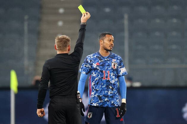 SOCCER - JPN vs MEX, test match GRAZ,AUSTRIA,17.NOV.20 - SOCCER - international match, Länderspiel, Nationalmannschaft Japan vs Mexico, test match. Image shows referee Manuel Schuettengruber (AUT) and Musashi Suzuki (JPN). Keywords: yellow card. GEPAxpictures xChristianxWalgram