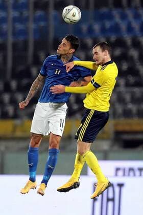 201118 This handout picture from the Swedish Football Association shows Italys Gianluca Scamacca in a match with Swedens Adam Hellborg during the football match in the qualifiers for the U21 European Championship on November 18, 2020 in Pisa, Italy,  Copyright: SvenskaxFotbollsförbundet BB201118BB748