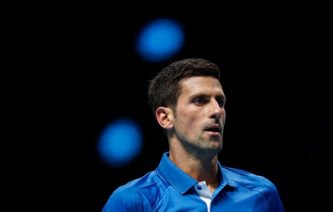 (201119) -- LONDON, Nov. 19, 2020 -- Novak Djokovic of Serbia looks dejected during the singles group match against Daniil Medvedev of Russia at the ATP, Tennis Herren World Tour Finals 2020 in London, Britain, on Nov. 18, 2020. ) (SP)BRITAIN-LONDON-TENNIS-ATP FINALS-DAY 4 HanxYan 