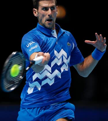 (201119) -- LONDON, Nov. 19, 2020 -- Novak Djokovic of Serbia hits a return during the singles group match against Daniil Medvedev of Russia at the ATP, Tennis Herren World Tour Finals 2020 in London, Britain, on Nov. 18, 2020. ) (SP)BRITAIN-LONDON-TENNIS-ATP FINALS-DAY 4 HanxYan 