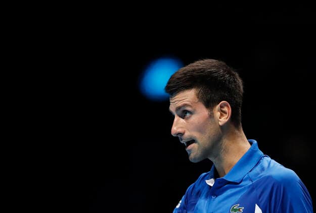 (201119) -- LONDON, Nov. 19, 2020 -- Novak Djokovic of Serbia looks dejected during the singles group match against Daniil Medvedev of Russia at the ATP, Tennis Herren World Tour Finals 2020 in London, Britain, on Nov. 18, 2020. ) (SP)BRITAIN-LONDON-TENNIS-ATP FINALS-DAY 4 HanxYan 