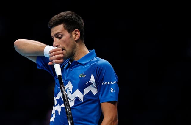 (201119) -- LONDON, Nov. 19, 2020 -- Novak Djokovic of Serbia looks dejected during the singles group match against Daniil Medvedev of Russia at the ATP, Tennis Herren World Tour Finals 2020 in London, Britain, on Nov. 18, 2020. ) (SP)BRITAIN-LONDON-TENNIS-ATP FINALS-DAY 4 HanxYan 
