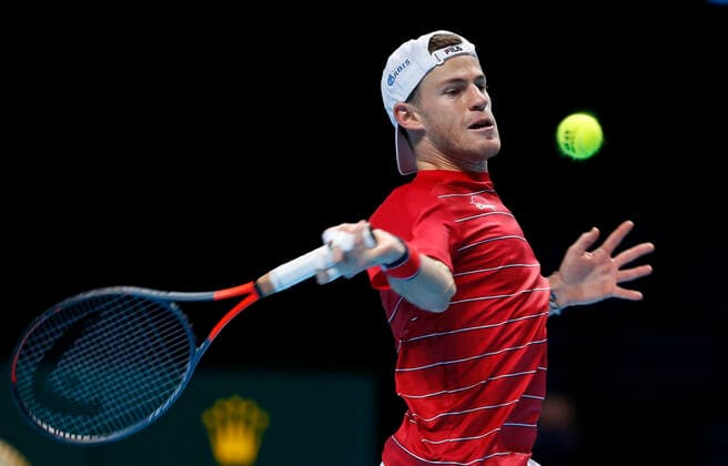 (201119) -- LONDON, Nov. 19, 2020 -- Diego Schwartzman of Argentina hits a return during the singles group match against Alexander Zverev of Germany at the ATP, Tennis Herren World Tour Finals 2020 in London, Britain, on Nov. 18, 2020. ) (SP)BRITAIN-LONDON-TENNIS-ATP FINALS-DAY 4 HanxYan 