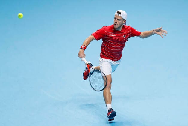(201119) -- LONDON, Nov. 19, 2020 -- Diego Schwartzman of Argentina hits a return during the singles group match against Alexander Zverev of Germany at the ATP, Tennis Herren World Tour Finals 2020 in London, Britain, on Nov. 18, 2020. ) (SP)BRITAIN-LONDON-TENNIS-ATP FINALS-DAY 4 HanxYan 