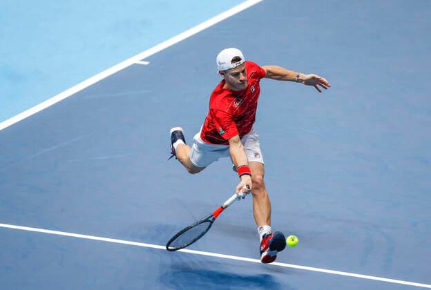(201119) -- LONDON, Nov. 19, 2020 -- Diego Schwartzman of Argentina hits a return during the singles group match against Alexander Zverev of Germany at the ATP, Tennis Herren World Tour Finals 2020 in London, Britain, on Nov. 18, 2020. ) (SP)BRITAIN-LONDON-TENNIS-ATP FINALS-DAY 4 HanxYan 
