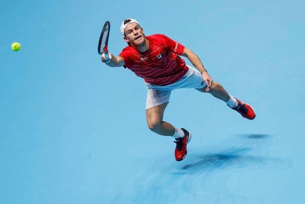 (201119) -- LONDON, Nov. 19, 2020 -- Diego Schwartzman of Argentina hits a return during the singles group match against Alexander Zverev of Germany at the ATP, Tennis Herren World Tour Finals 2020 in London, Britain, on Nov. 18, 2020. ) (SP)BRITAIN-LONDON-TENNIS-ATP FINALS-DAY 4 HanxYan 