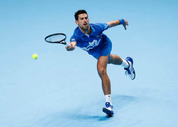 (201122) -- LONDON, Nov. 22, 2020 -- Novak Djokovic of Serbia hits a return during the singles group semifinal against Dominic Thiem of Austria at the ATP, Tennis Herren World Tour Finals 2020 in London, Britain, Nov. 21, 2020. ) (SP)BRITAIN-LONDON-TENNIS-ATP FINALS-SEMIFINAL HanxYan 