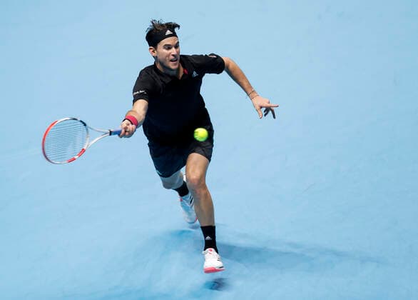(201122) -- LONDON, Nov. 22, 2020 -- Dominic Thiem of Austria hits a return during the singles group semifinal against Novak Djokovic of Serbia at the ATP, Tennis Herren World Tour Finals 2020 in London, Britain, Nov. 21, 2020. ) (SP)BRITAIN-LONDON-TENNIS-ATP FINALS-SEMIFINAL HanxYan 
