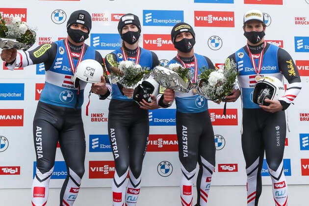 LUGE - FIL WC Innsbruck Igls 2020 INNSBRUCK,AUSTRIA,29.NOV.20 - LUGE - FIL World Cup Igls, artificial track, relay. Image shows the rejoicing of the austrian team. Keywords: trophy. GEPAxpictures xPatrickxSteiner