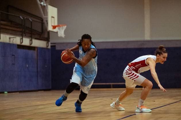 BERGISCH GLADBACH, GERMANY, DEC 2nd Marquita Lashae Waller ( 13 Bascats) goes forward during the Toyota-DBBL-Cup game between the Rheinland Lions and the Capitol Bascats Düsseldorf at Schulzentrum Herkenrath, Bergisch Gladbach, Germany. T. HERZBERG Rheinland Lions vCapitol Bascats Düsseldorf 