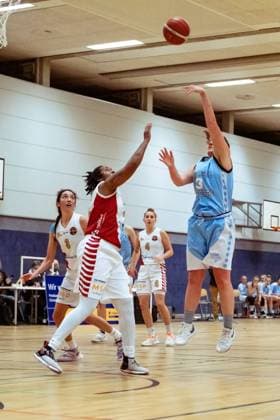 BERGISCH GLADBACH, GERMANY, DEC 2nd Elle Hendershot ( 3 Bascats) goes scores two points during the Toyota-DBBL-Cup game between the Rheinland Lions and the Capitol Bascats Düsseldorf at Schulzentrum Herkenrath, Bergisch Gladbach, Germany. T. HERZBERG Rheinland Lions vCapitol Bascats Düsseldorf 