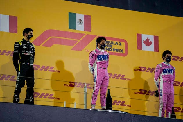 December 6, 2020, Sakhir, Bahrain: (L to R) ESTEBAN OCON of France and Renault F1, SERGIO PEREZ of Mexico and Racing Point F1 Team and LANCE STROLL of Canada and Racing Point F1 Team are seen on the podium after the 2020 FIA Formula 1 Sakhir Grand Prix at Bahrain International Circuit in Sakhir, Bahrain. Sakhir Bahrain - ZUMAg147 20201206_zap_g147_047 Copyright: xJamesxGasperottix