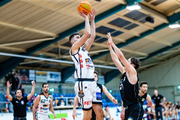 Sandro Antunovic 1 BSW Sixers , Mark Gebhardt 11 ART Gaints Duesseldorf during the 2020 season 21 men in the Barmer Bundesliga ProB between BSW Sixers and ART Giants Duesseldorf in the Ballsporthalle Sandersdorf on 12 December 2020 in Sandersdorf, Sachsen Anhalt, Germany