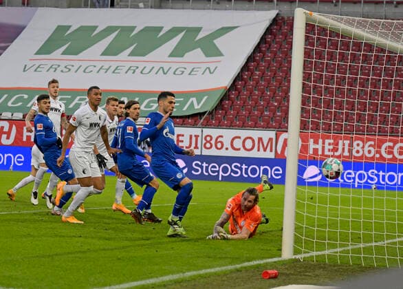 13 12 2020, Soccer 1 Bundesliga FC Augsburg Schalke 04 13 12 2020, Soccer 1 Bundesliga 2020 2021, 11 Matchday, FC Augsburg FC Schalke 04, in the WWK Arena Augsburg Own goal to 1 0 for Augsburg by Suat Serdar FC Schalke 04 re Goalkeeper Ralf Fährmann FC Schalke 04 without a chance Photo Bernd Feil M i S Pool For journalistic purposes only For editorial use only According to the regulations of the DFL Deutsche Fußball Liga, it is prohibited to use or have used photographs taken in the stadium and or of the match in the form of sequence images and or video-like photo sequences DFL regulations prohibit any use of photographs as image sequences and or quasi video National and international NewsAgencies OUT Augsburg WWK Arena Bayern Deutschland Poolfoto ,EDITORIAL USE ONLY