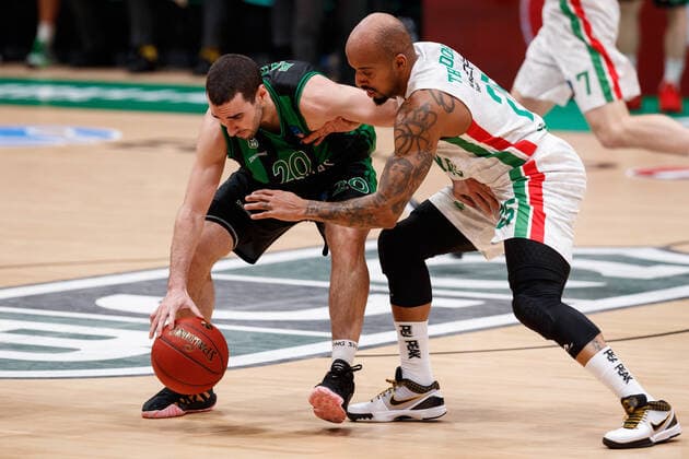 December 15, 2020, Badalona, Spain: Ferran Bassas of Club Joventut Badalona in action with Jordan Theodore of UNICS Kazan during the 7 days Eurocup match between Club Joventut Badalona and UNICS Kazan at Pabellon Olimpico de Badalona in Barcelona, Spain. Badalona Spain - ZUMAd159 20201215_zia_d159_045 Copyright: xDavidxRamirezx