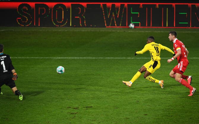 Football, men, 2020 2021 season, 1 Bundesliga 13 matchday , 1 FC Union Berlin Borussia Dortmund, v l goalkeeper Andreas Luthe 1 FC Union Berlin , Youssoufa Moukoko Borussia Dortmund , Robin Knoche 1 FC Union Berlin , 18 12 2020, Copyright: xMatthiasxKochx
