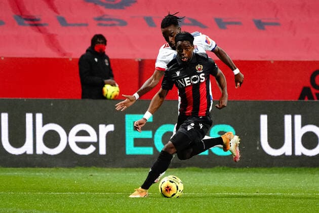 Jordan Lotomba (OGC Nice) - Maxwel Cornet (Lyon) FOOTBALL : OGC Nice vs Lyon - Ligue 1 Uber Eats - Nice - 19 12 2020 NorbertScanella PanoramiC 